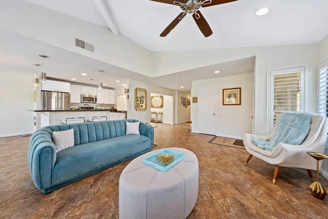 a living room with furniture and a couch