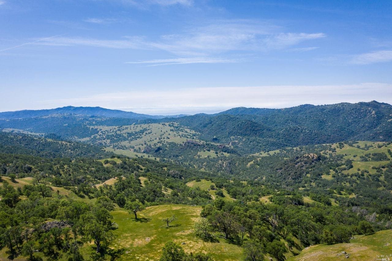 Undisclosed Address Livermore, CA 94550 - Photo 1 of 1 an aerial view of houses covered in trees