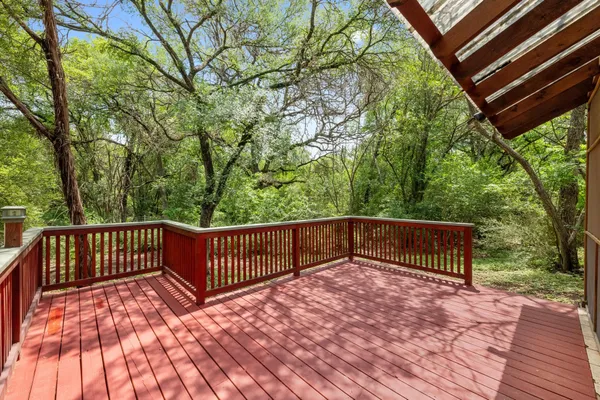 a view of outdoor space with deck and backyard