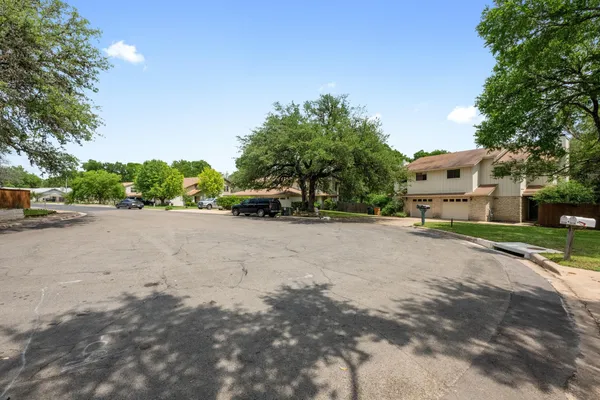 a road view with yard