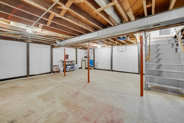 a view of a room with wooden walls