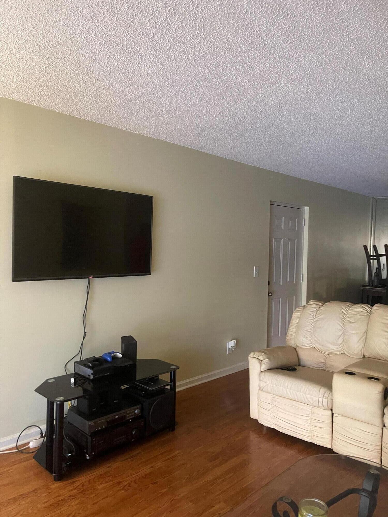 9900 Pineapple Tree Drive, Unit 206 Boynton Beach, FL 33436 - Photo 11 of 18 living room 5