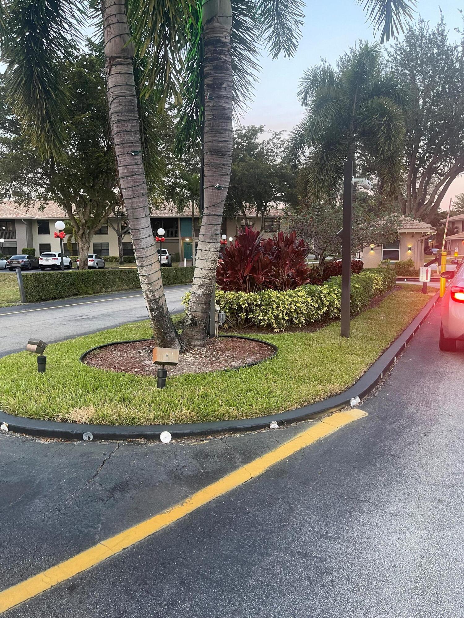 9900 Pineapple Tree Drive, Unit 206 Boynton Beach, FL 33436 - Photo 2 of 18 second front entrance