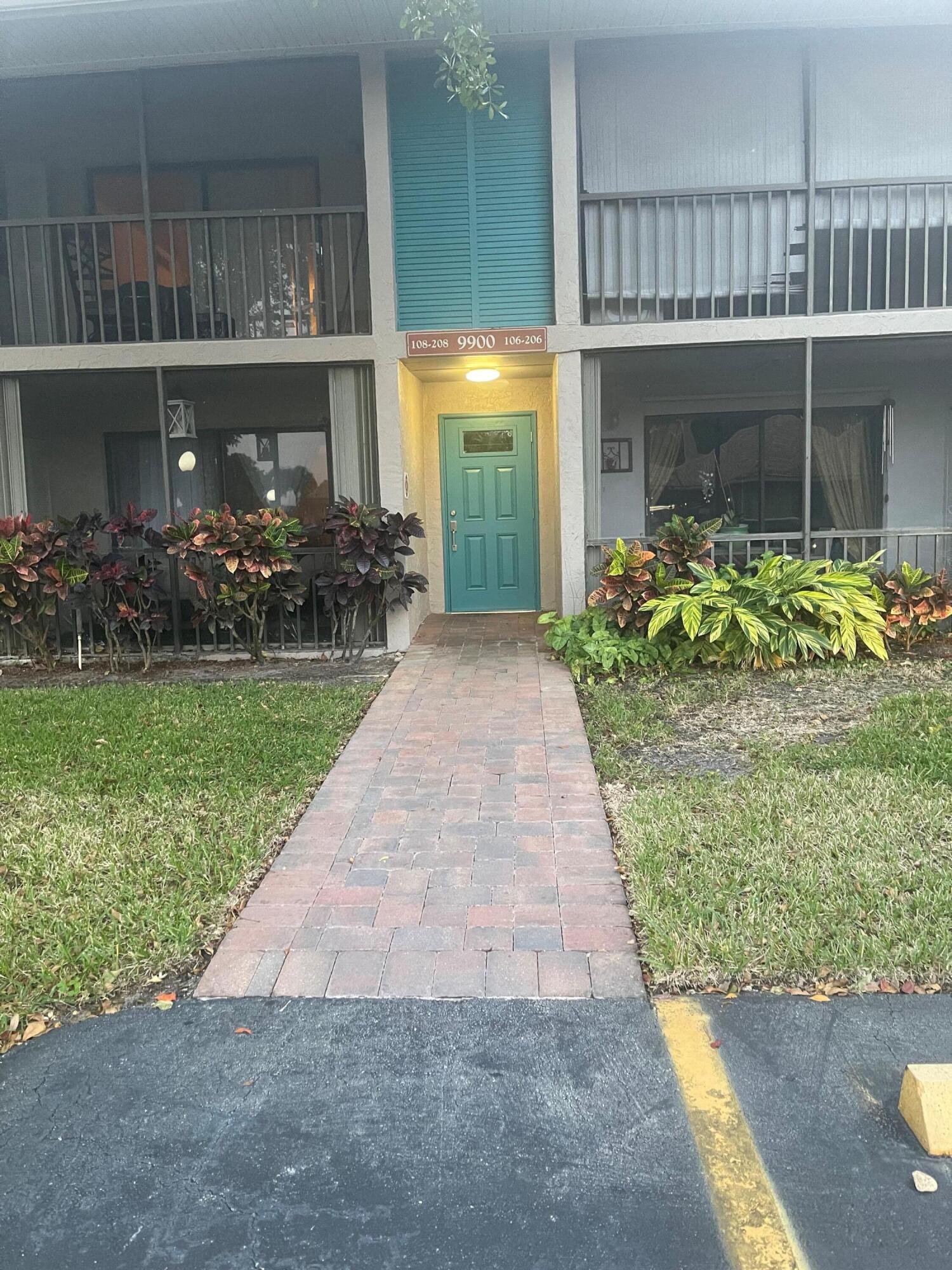 9900 Pineapple Tree Drive, Unit 206 Boynton Beach, FL 33436 - Photo 3 of 18 entrance to building