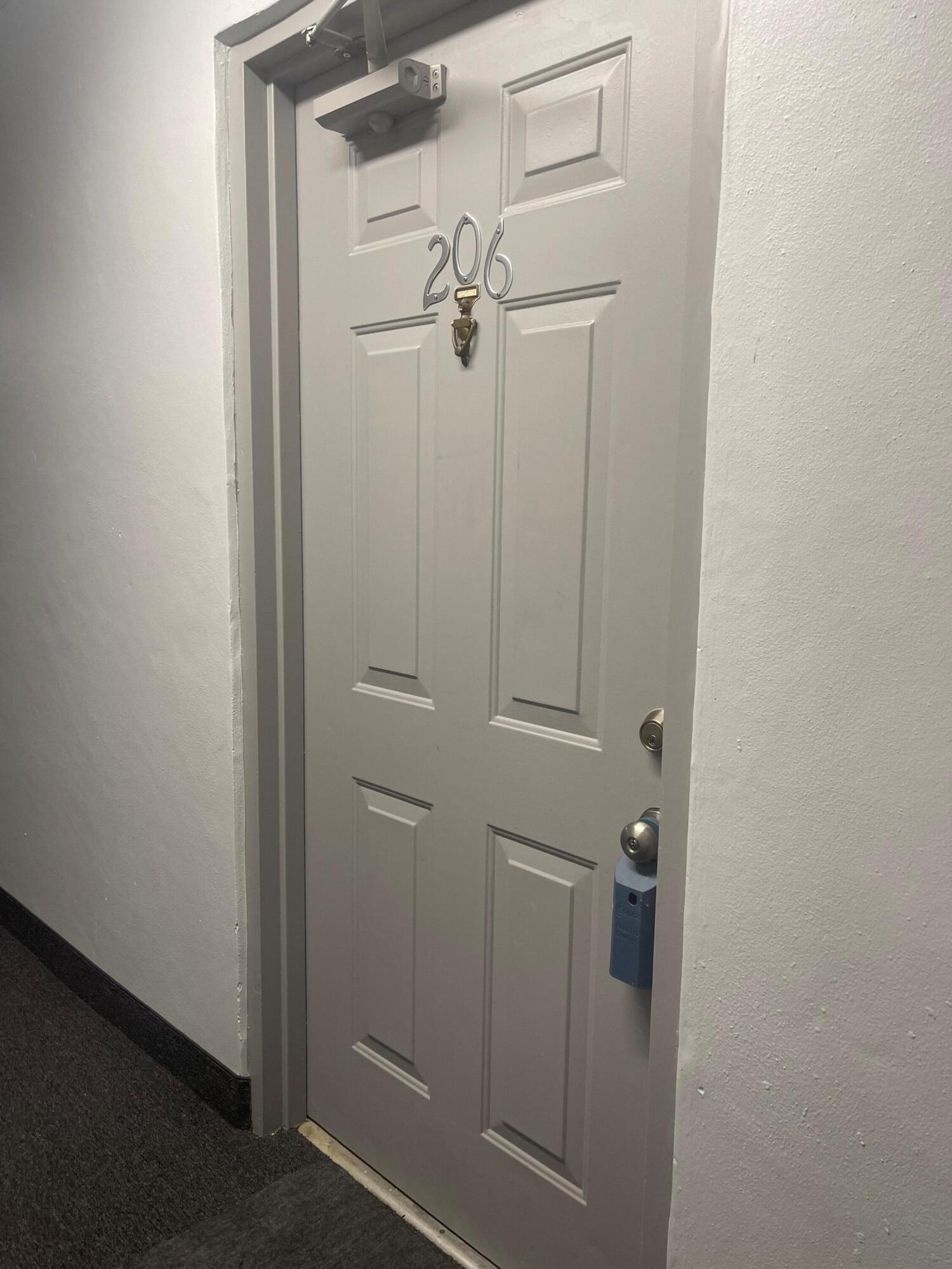 9900 Pineapple Tree Drive, Unit 206 Boynton Beach, FL 33436 - Photo 4 of 18 front door