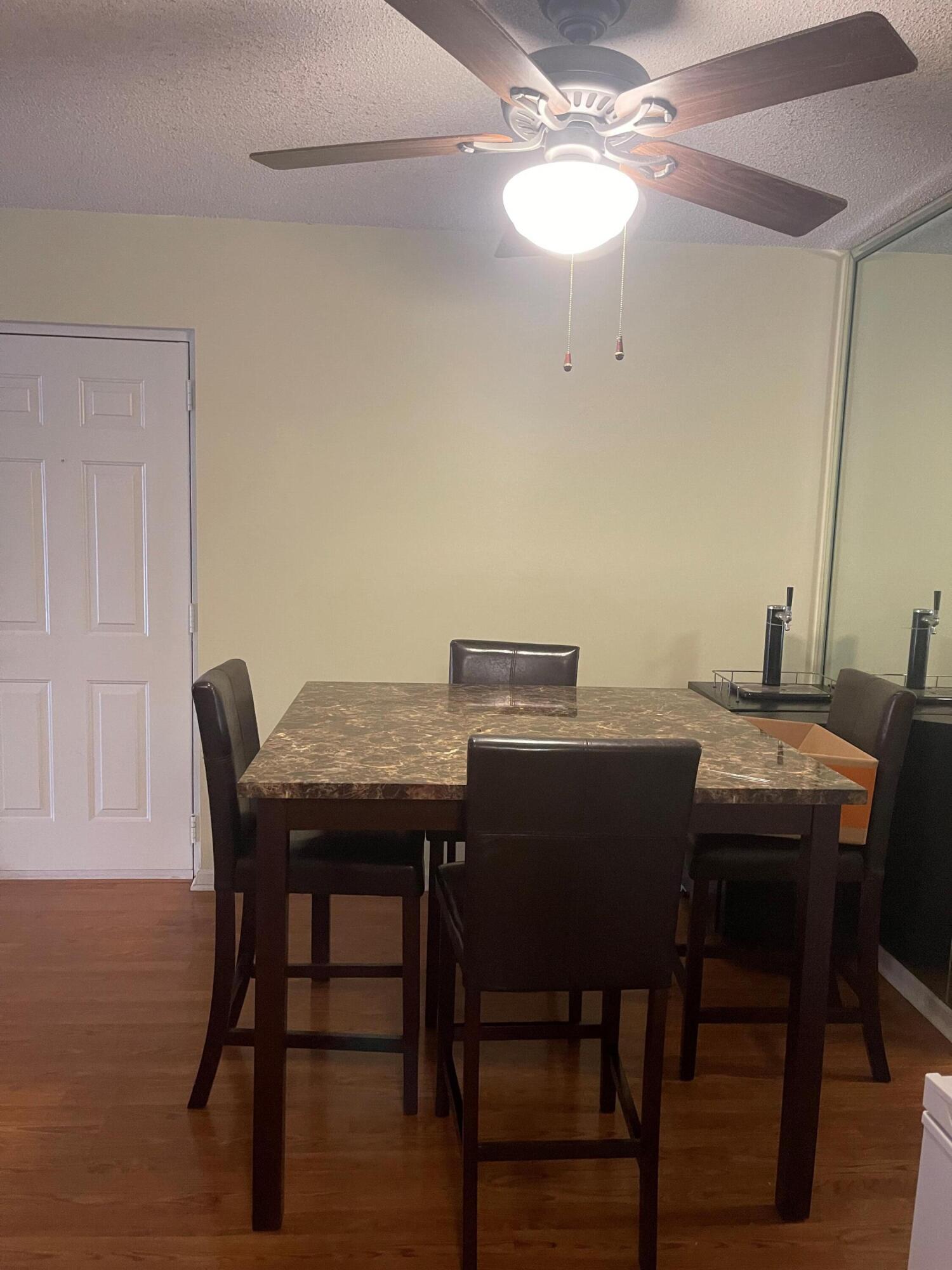 9900 Pineapple Tree Drive, Unit 206 Boynton Beach, FL 33436 - Photo 5 of 18 dining room 3