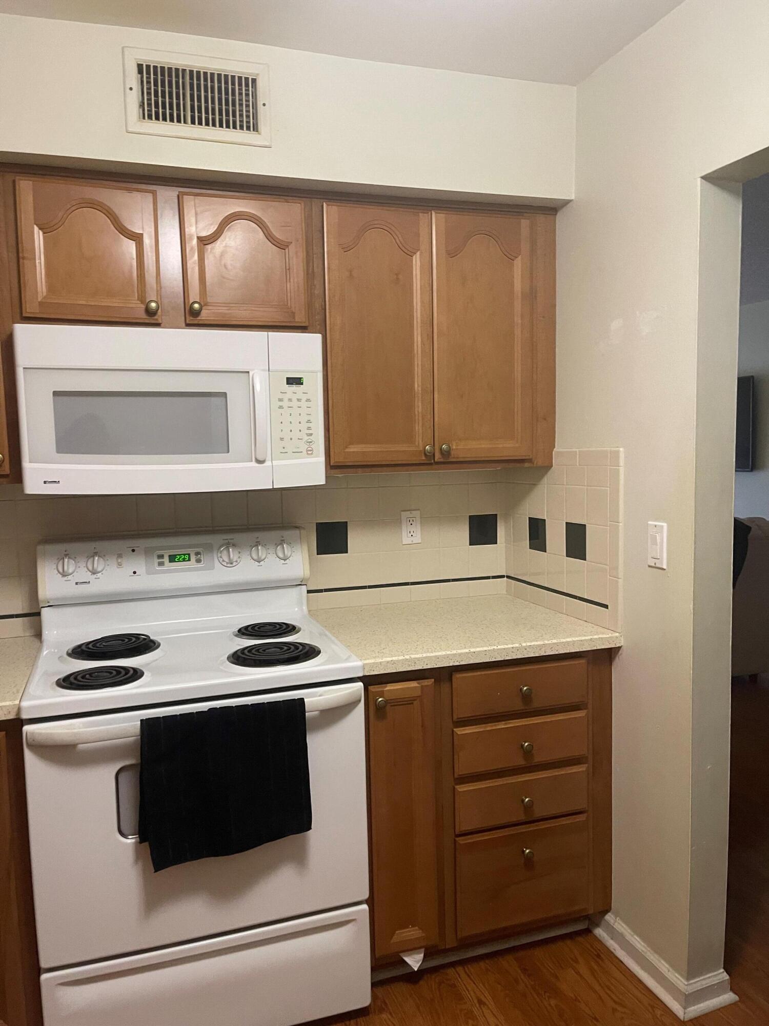 9900 Pineapple Tree Drive, Unit 206 Boynton Beach, FL 33436 - Photo 6 of 18 kitchen