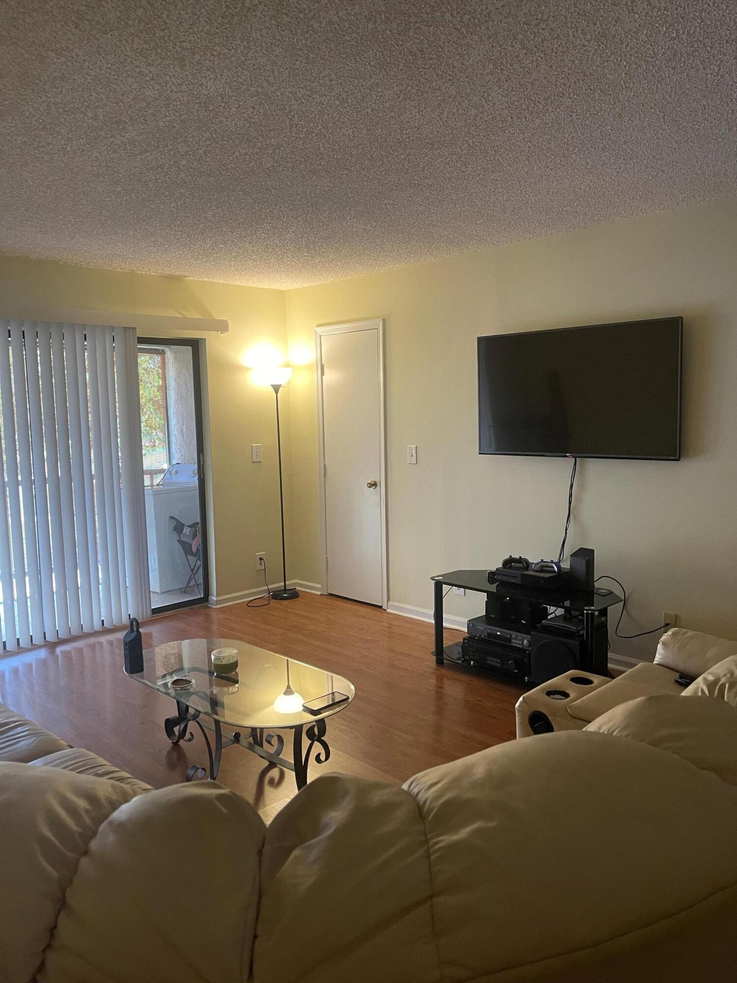 9900 Pineapple Tree Drive, Unit 206 Boynton Beach, FL 33436 - Photo 10 of 18 living room