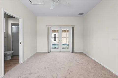 an empty room with a bathroom