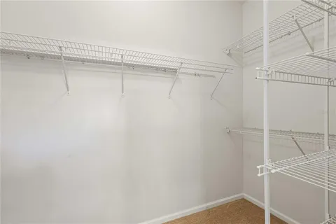 a view of a room with racks on the wall