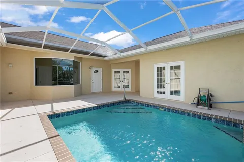 a view of a house with a swimming pool