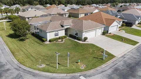 an aerial view of a house with outdoor space
