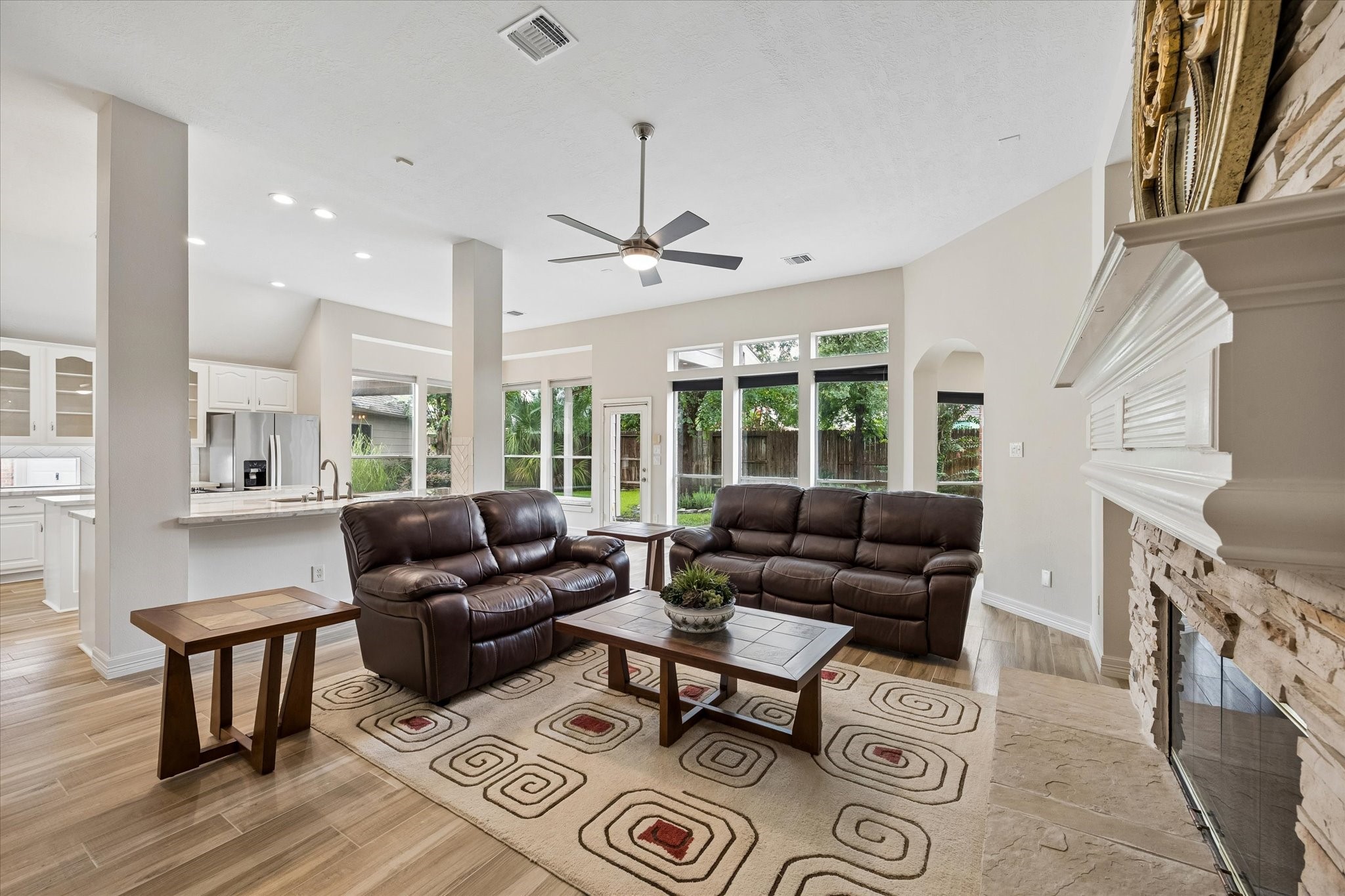 5306 Summerland Ridge Court Houston, TX 77041 - Photo 9 of 33 a living room with furniture and a chandelier