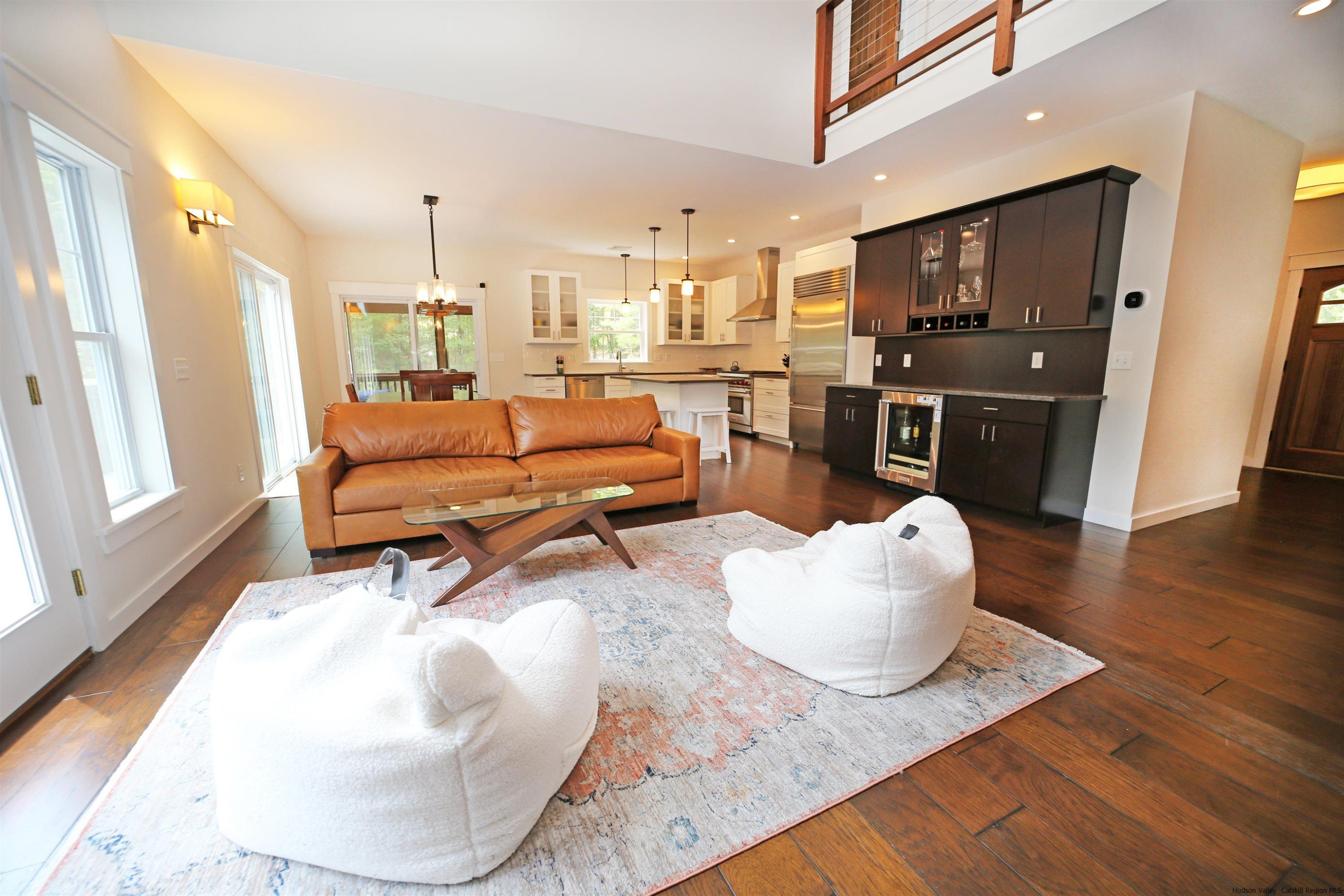 9 Magnolia Kingston, NY 12401 - Photo 18 of 33 a living room with furniture and kitchen view
