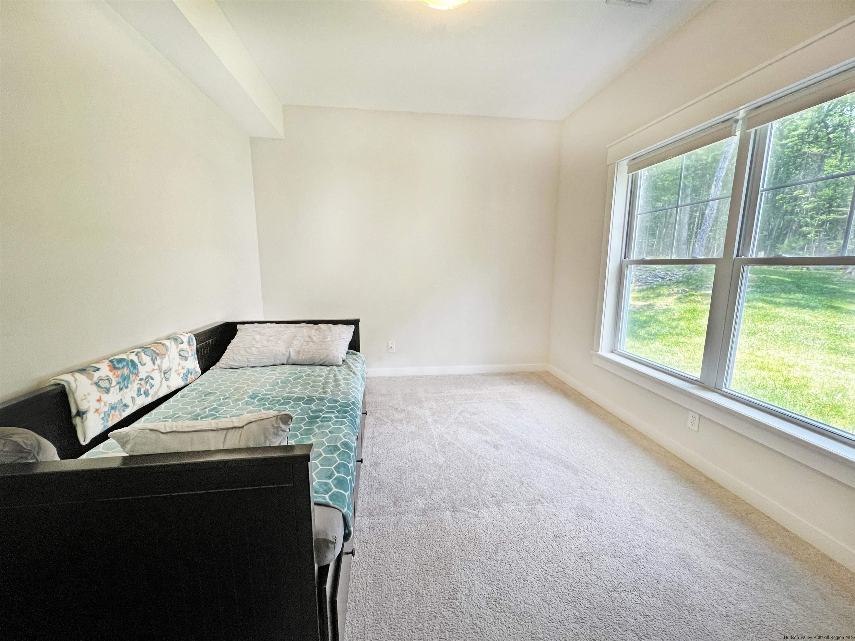 9 Magnolia Kingston, NY 12401 - Photo 20 of 33 a bedroom with a bed and a window