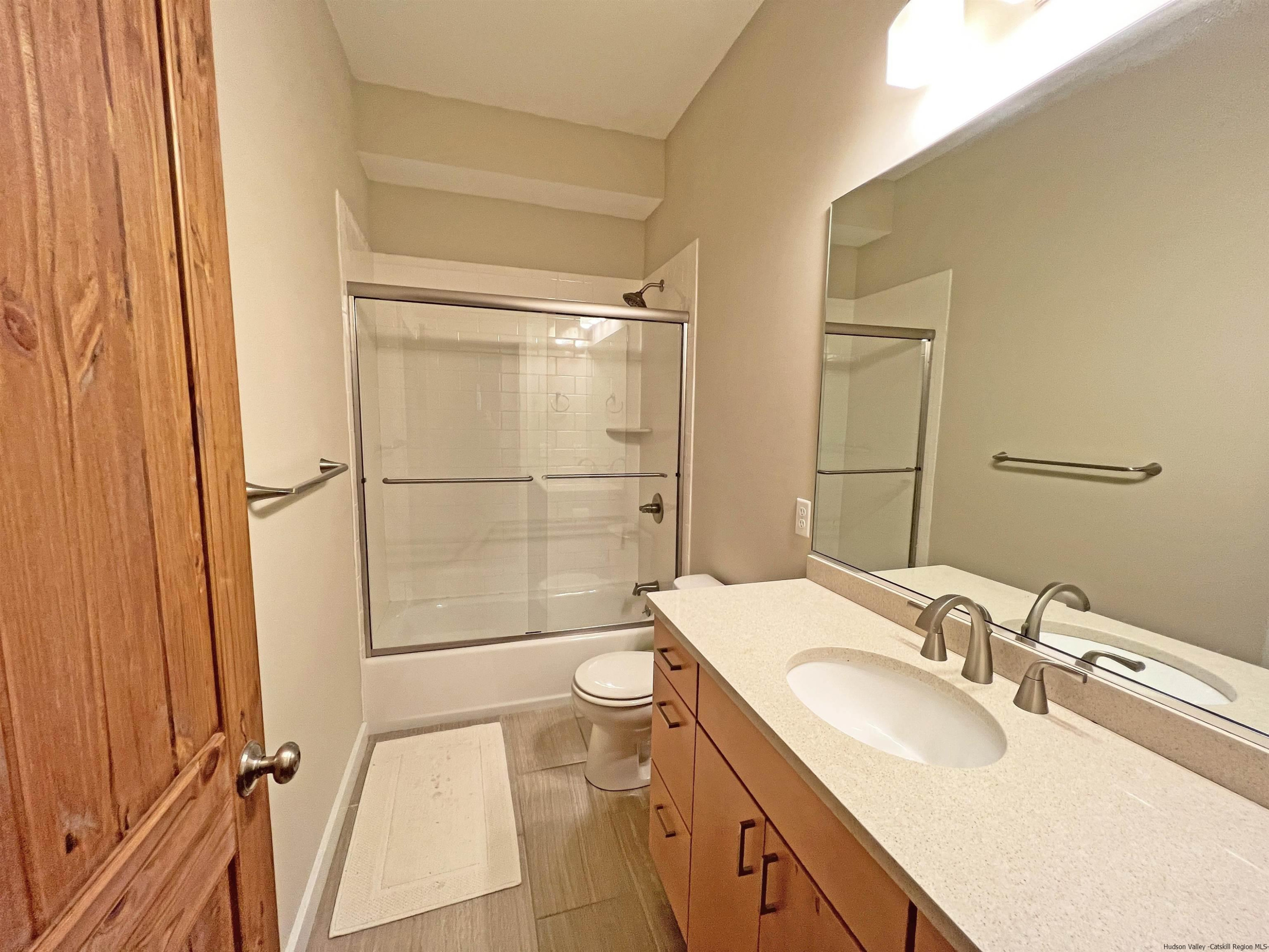 9 Magnolia Kingston, NY 12401 - Photo 30 of 33 a bathroom with a sink toilet and shower