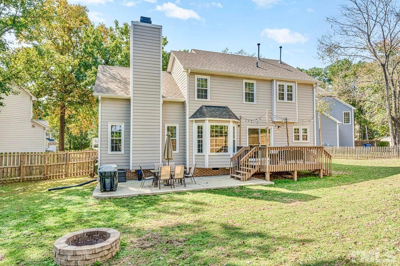 8824 Whitby Court Raleigh, NC 27615 - Photo 25 of 25 a front view of a house with a yard