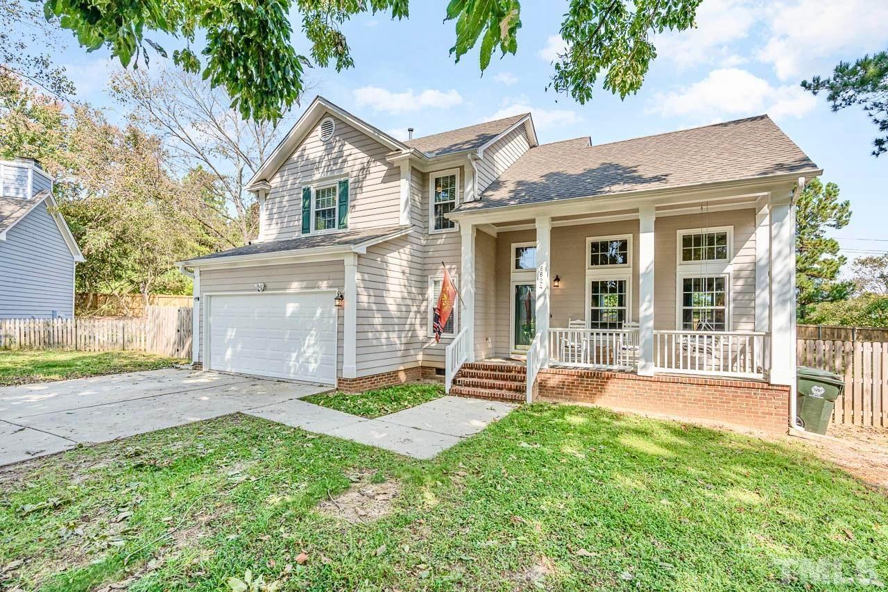 8824 Whitby Court Raleigh, NC 27615 - Photo 3 of 25 front view of a house with a yard
