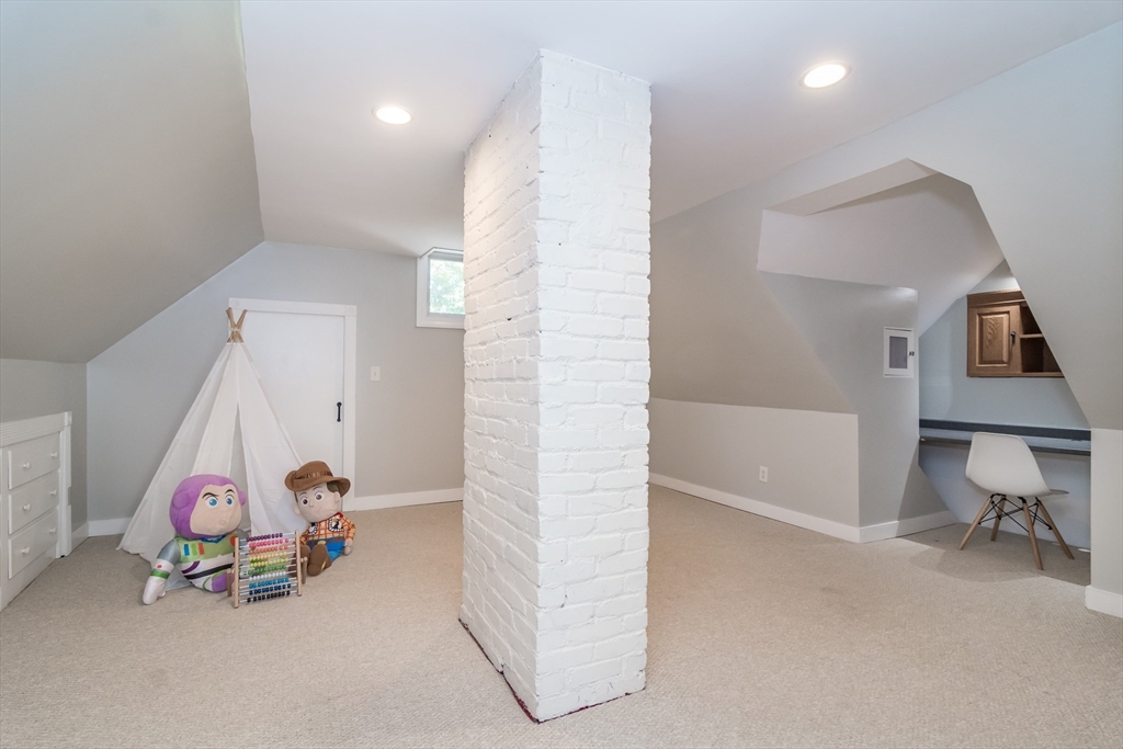 58 Beaver Dam Road Natick, MA 01760 - Photo 17 of 24 a view of a room with gym equipment