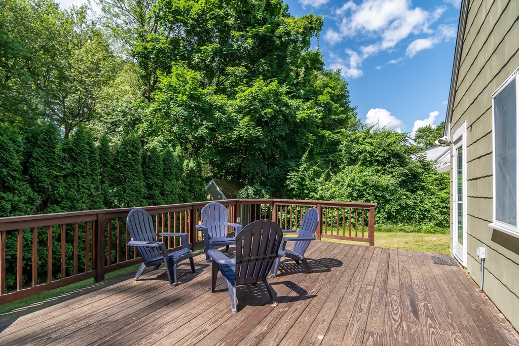 58 Beaver Dam Road Natick, MA 01760 - Photo 21 of 24 a view of balcony with deck and outdoor seating