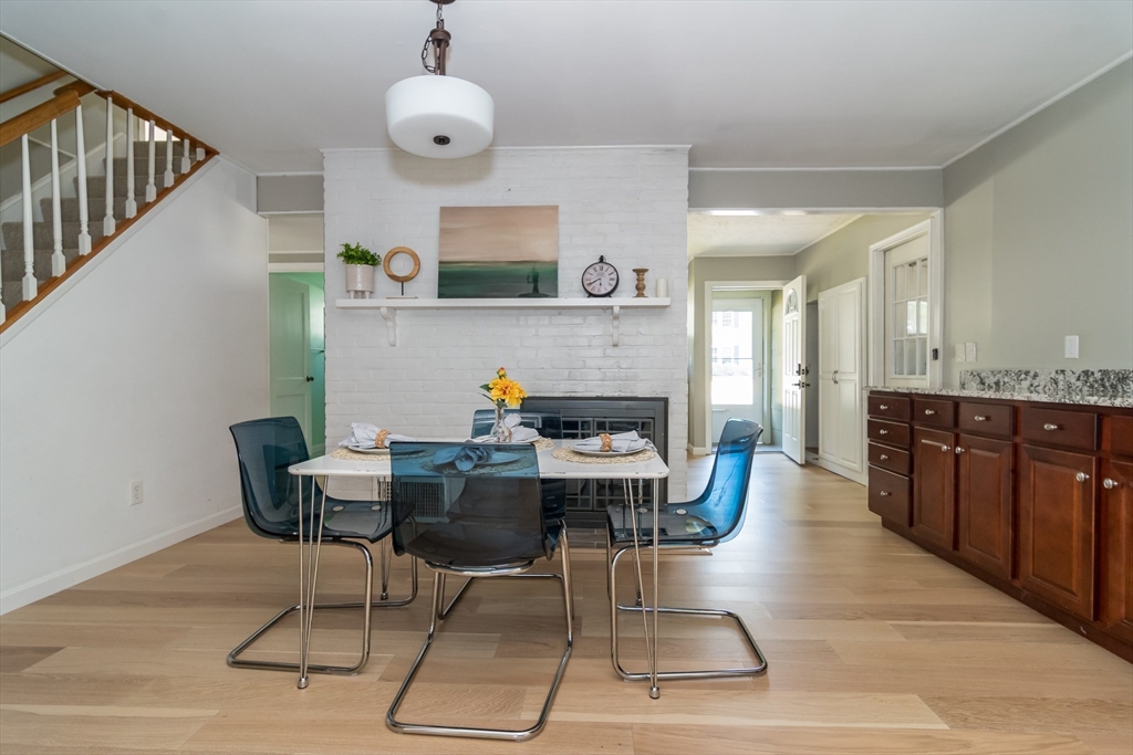 58 Beaver Dam Road Natick, MA 01760 - Photo 8 of 24 a dining room with furniture and wooden floor