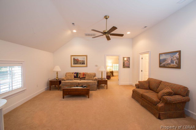 87 Eagle Point Road Lancaster, VA 22503 - Photo 25 of 36 a living room with furniture