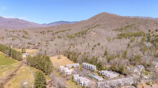 a view of a house with a mountain