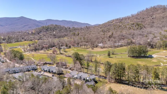 a view of a lake with mountains in the background