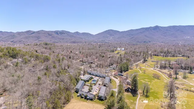 a view of water with a building in the background