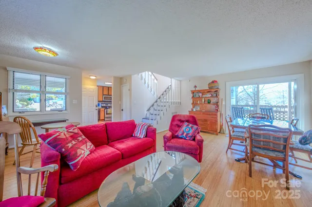 a living room with furniture and a windows