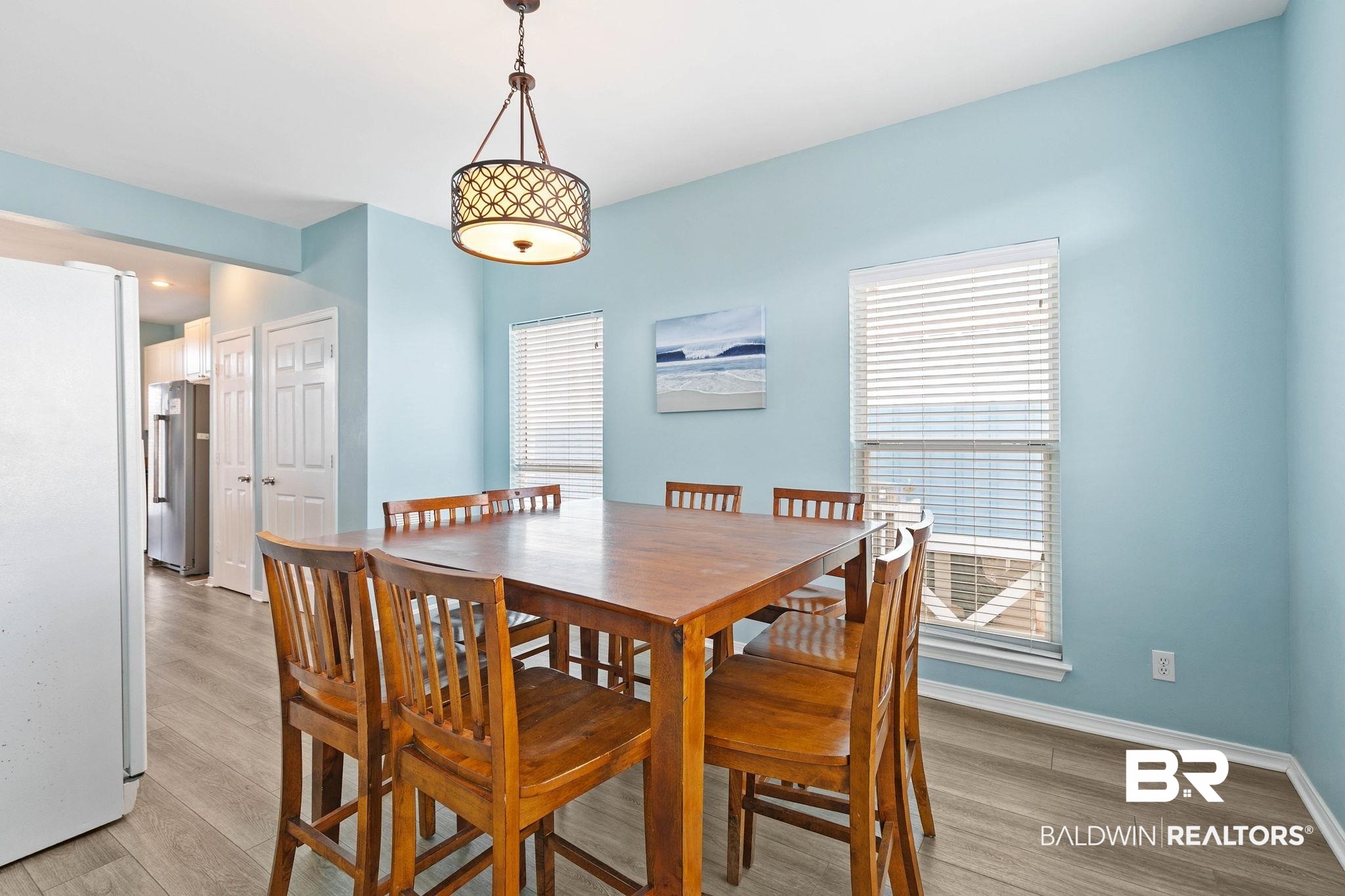 545 Plantation Road, Unit 3 Gulf Shores, AL 36542 - Photo 18 of 54 Dining room with light wood finished floors