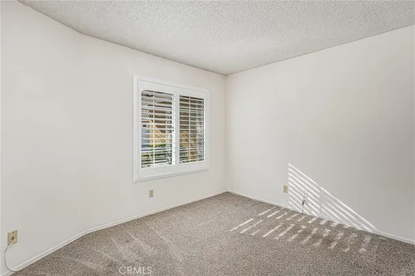 a view of a room with a window