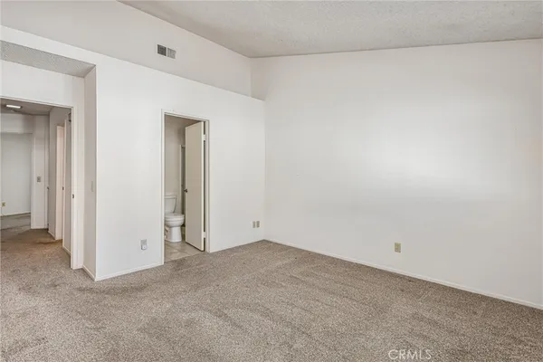 an empty room with closet
