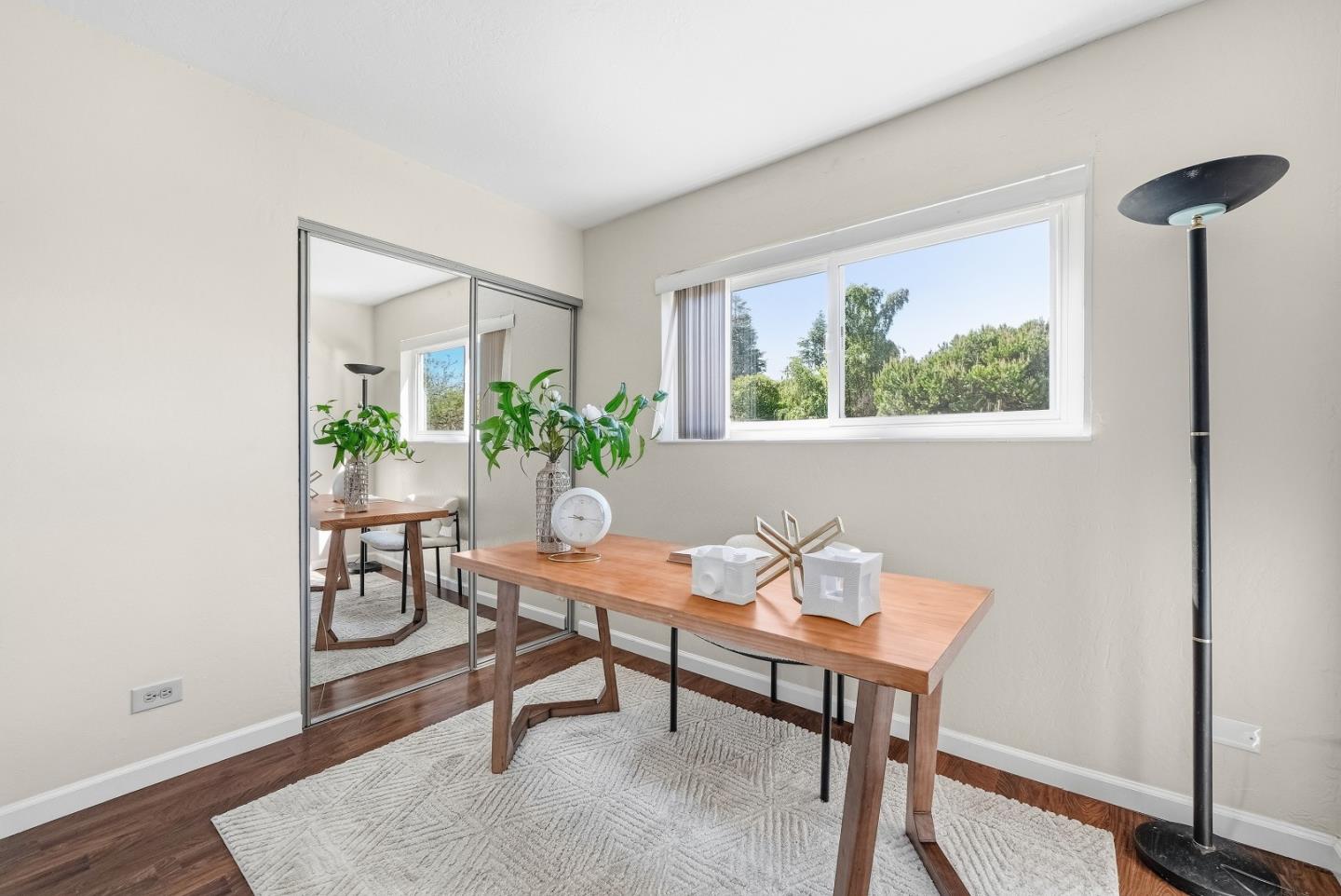 701 North Rengstorff Avenue, Unit 7 Mountain View, CA 94043 - Photo 15 of 32 a view of a workspace room with furniture and wooden floor