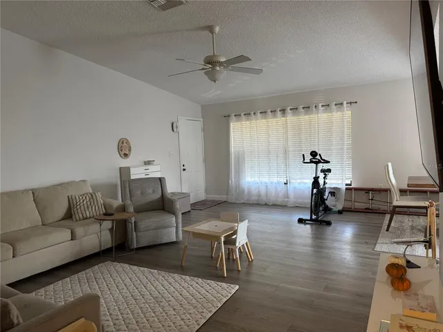 a living room with furniture and a couch