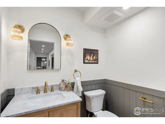 a spacious bedroom with a large bed and a large window