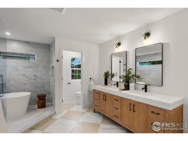 a view of a workspace with furniture