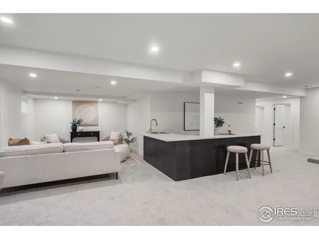 a living room with furniture and a couch