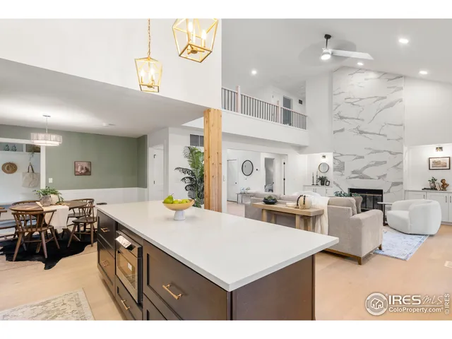 a view of a living room and dining room