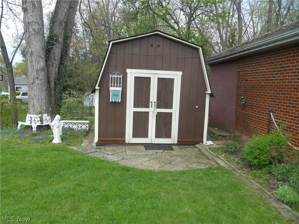 9409 David Road Garfield Heights, OH 44125 - Photo 17 of 20 Backyard has a large shed.