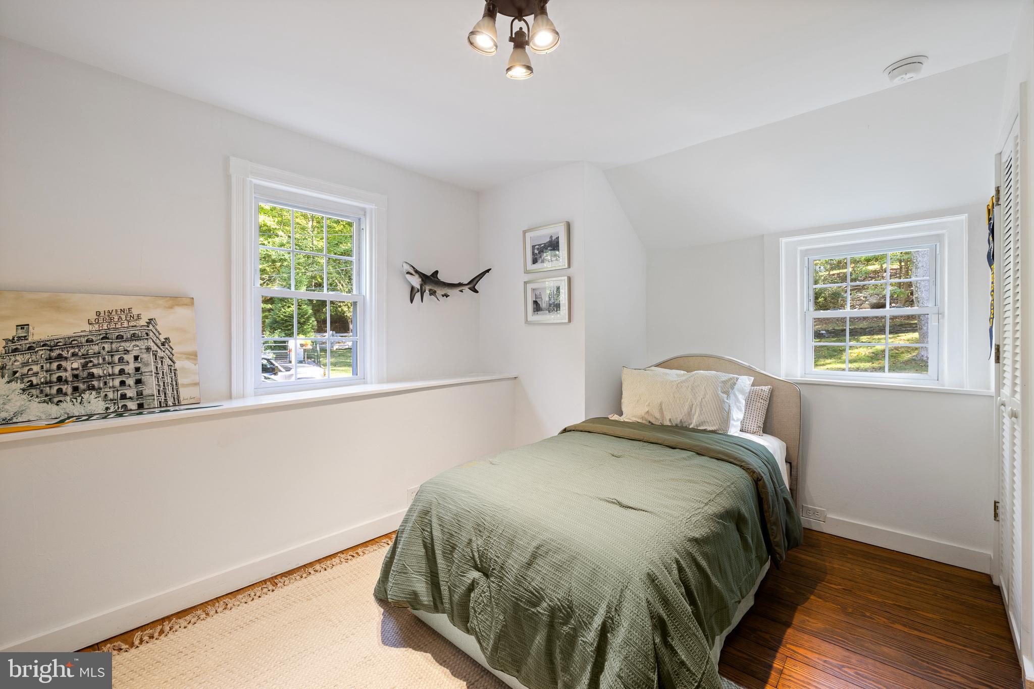 106 Manchester Road Media, PA 19063 - Photo 17 of 34 a bedroom with a bed and a window