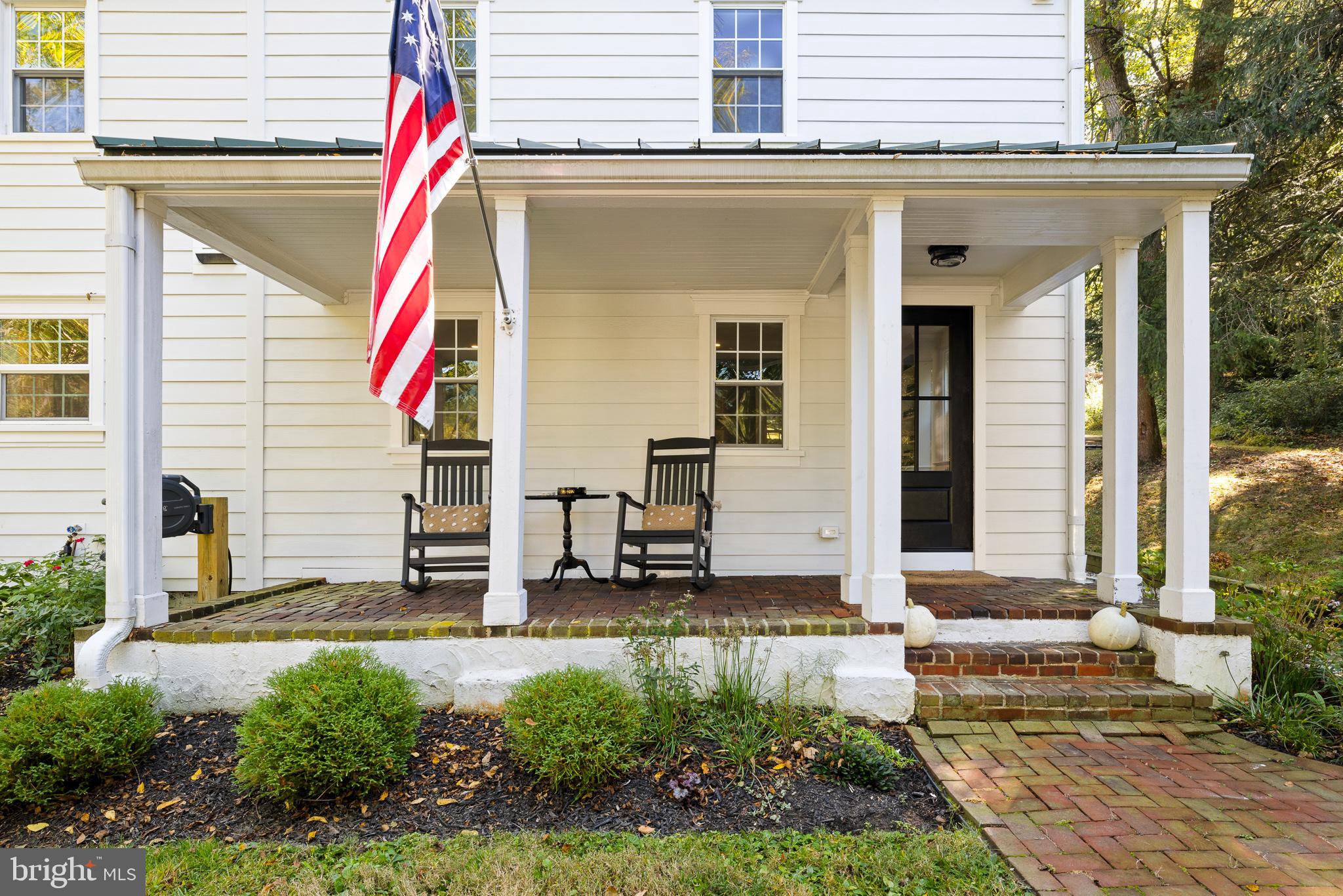 106 Manchester Road Media, PA 19063 - Photo 3 of 34 a front view of a house with a small yard