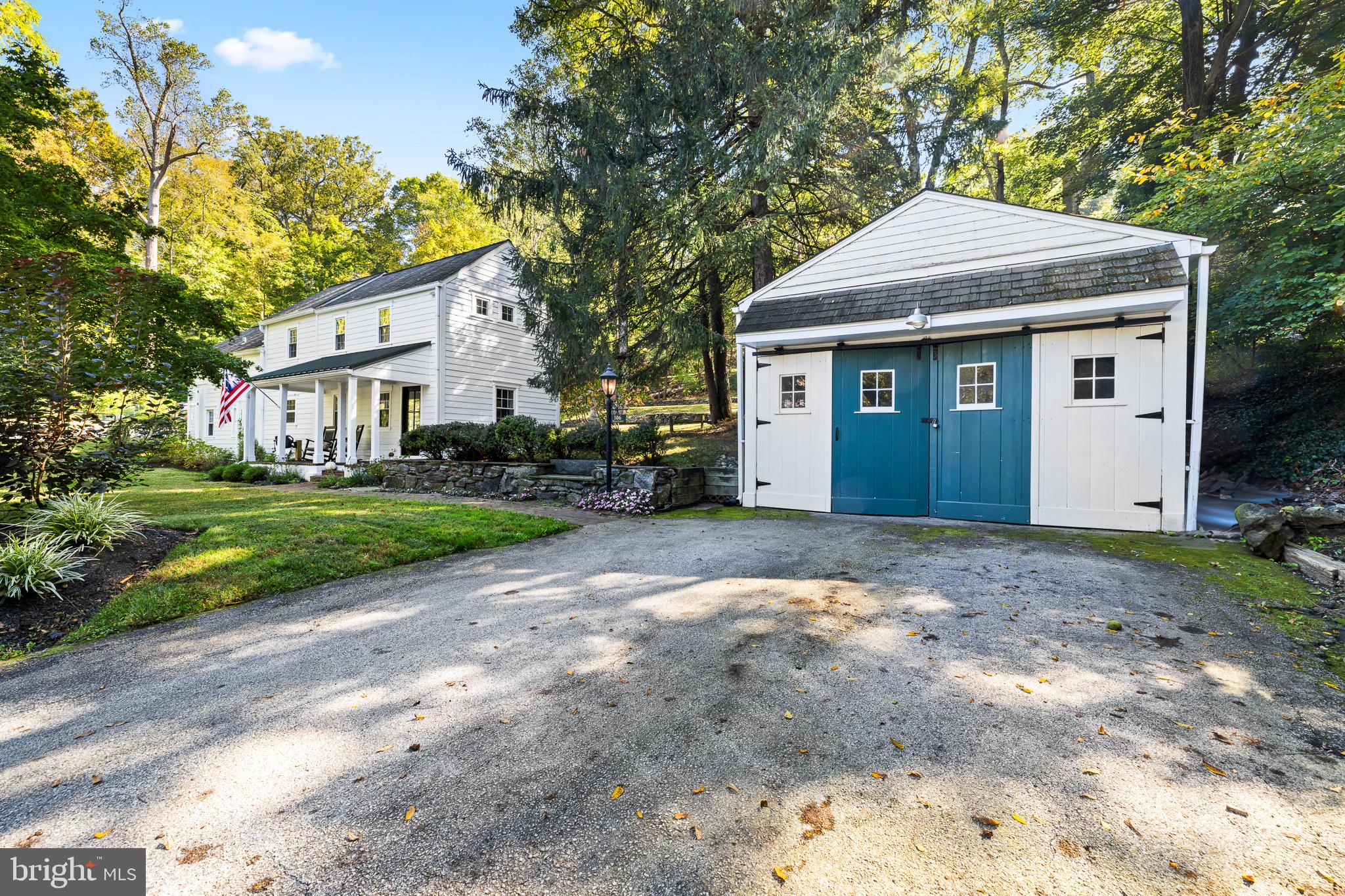 106 Manchester Road Media, PA 19063 - Photo 33 of 34 a front view of a house with a yard and garage