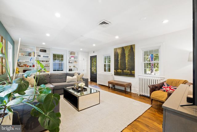 a living room with furniture and a couch