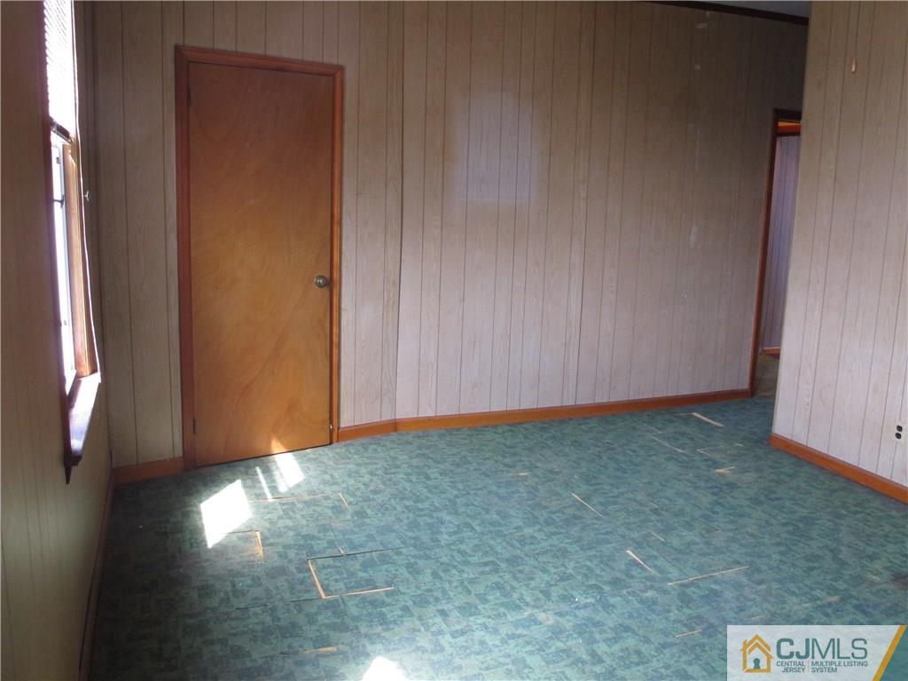 350 Summit Avenue Perth Amboy, NJ 08861 - Photo 12 of 20 a view of an empty room and window