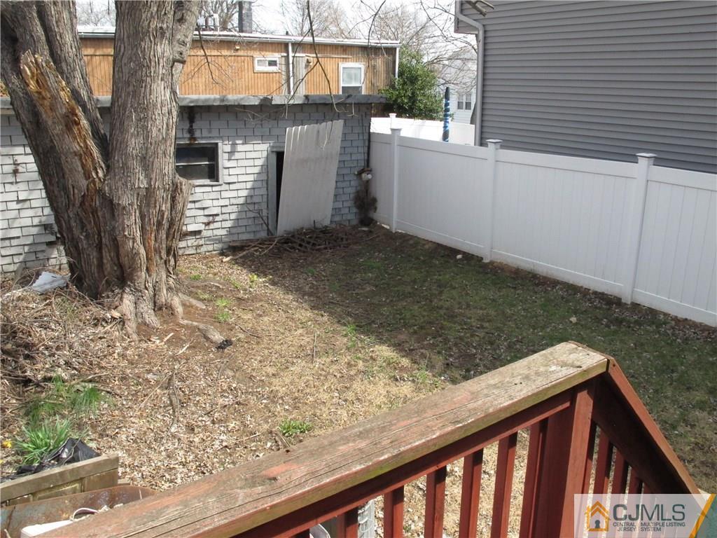 350 Summit Avenue Perth Amboy, NJ 08861 - Photo 13 of 20 a view of a wooden door and a yard