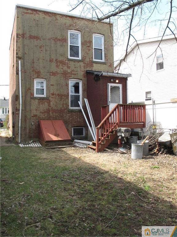 350 Summit Avenue Perth Amboy, NJ 08861 - Photo 14 of 20 a view of a house with backyard and sitting area