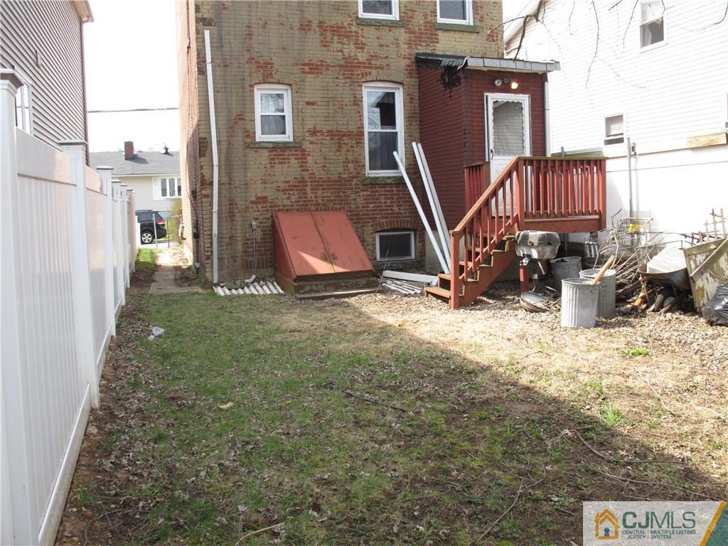 350 Summit Avenue Perth Amboy, NJ 08861 - Photo 15 of 20 a view of a patio with a table and chairs
