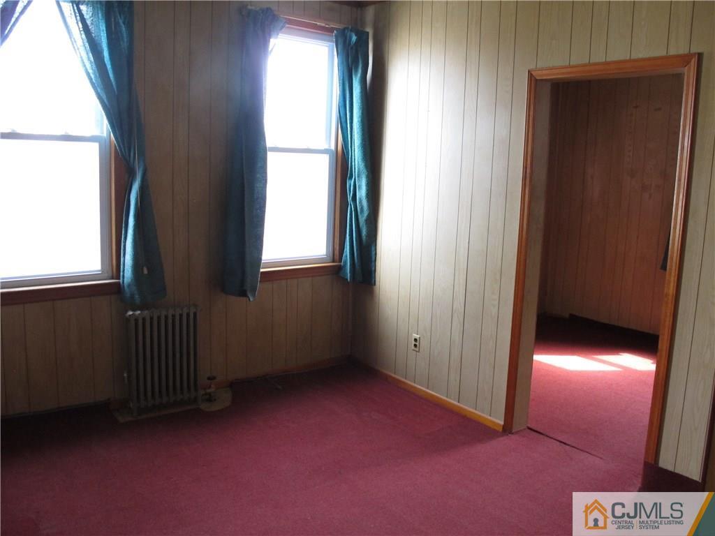 350 Summit Avenue Perth Amboy, NJ 08861 - Photo 8 of 20 an empty room with windows