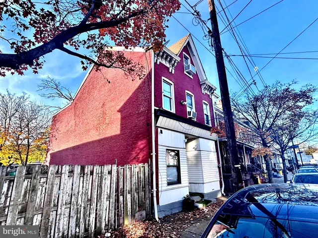 a street sign on a road next to a road